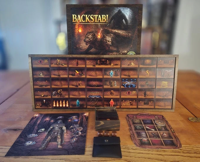 BACKSTAB! upright dungeon wall and equipment laid out for play
